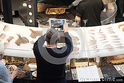 Foodcourt gastronomic center in Zaryadie park, Moscow. Editorial Stock Photo