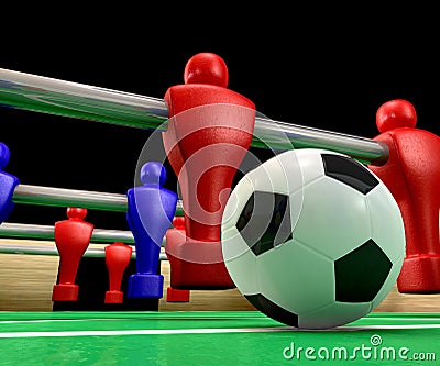 foosball table at ground level with a soccer ball being competed for 