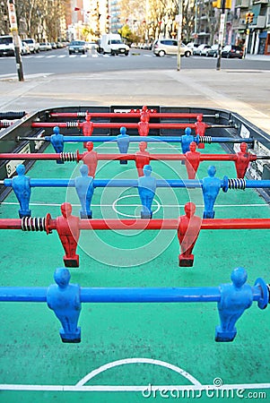 Foosball table player Stock Photo