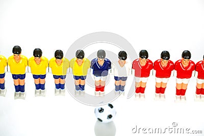 Foosball table players Stock Photo