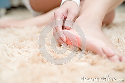 Foot ankle injury pain women touch her foot painful, healthcare and medicine concept Stock Photo