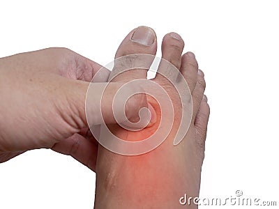 Foot with extensor tendonitis, hand rubbing feet, suffer from pain. Health and medical Stock Photo