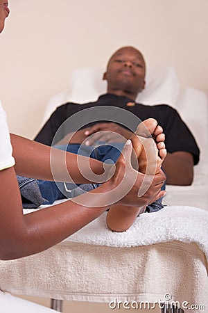 Foot massage Stock Photo