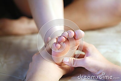 Foot massage Stock Photo