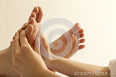 Foot massage Stock Photo