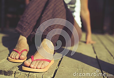 Foot in thongs Stock Photo