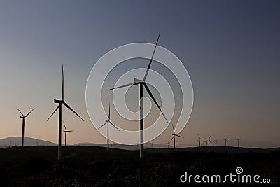 Footage of windmills farm and Aegean landscape in Sigacik / Seferihisar district of Izmir / Turkey. Stock Photo