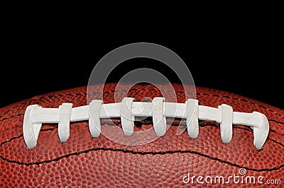 Football Closeup Isolated on Black Stock Photo