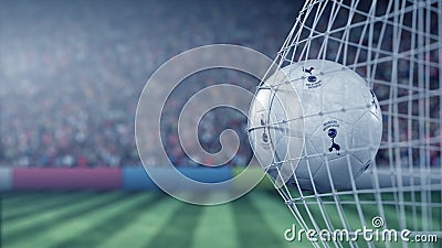 Tottenham Hotspur football club logo on the ball in football net. Editorial conceptual 3D rendering Editorial Stock Photo