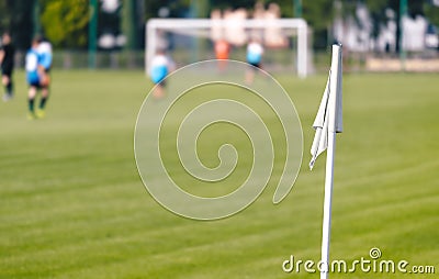 Football Corner White Flag. Soccer Turf Pitch in a Blurred Background Stock Photo