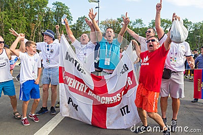 Football fans of England with the national flag glorify their team in the World Cup before the match England Sweden Editorial Stock Photo