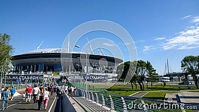 Football fans heading towards the stadium in summer Sunny day in St. Petersburg Editorial Stock Photo