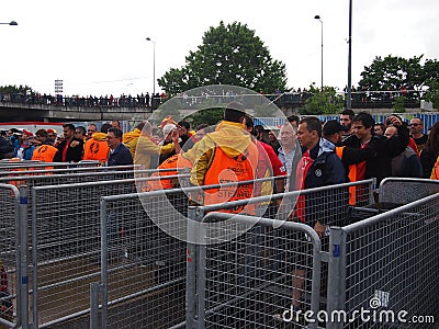 Football fans searched by security Editorial Stock Photo