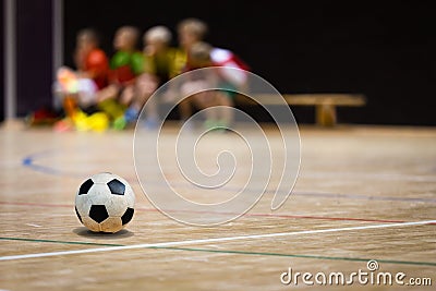 Football Futsal Ball and Youth Team. Indoor Soccer Sports Hall Stock Photo