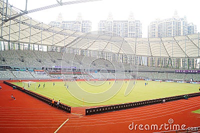 Football match in Baoan Stadium Editorial Stock Photo