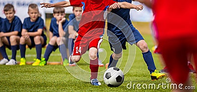 Football match for young players. Training and football soccer tournament for children Editorial Stock Photo
