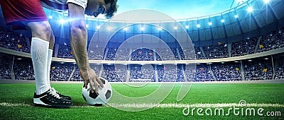 Football player with ball Stock Photo