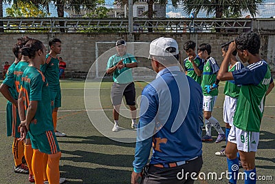 The football referee informs team players about the rules of the game Editorial Stock Photo