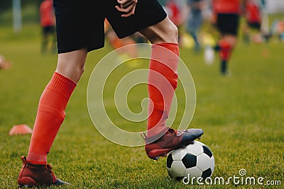 Football Soccer Practice Session. Young Soccer Player in Training with Ball Stock Photo