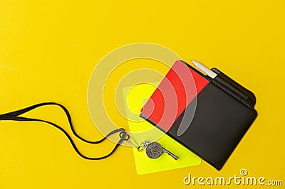 Football soccer referee equipment on yellow background. Top view, space for your text. Sport concept Stock Photo