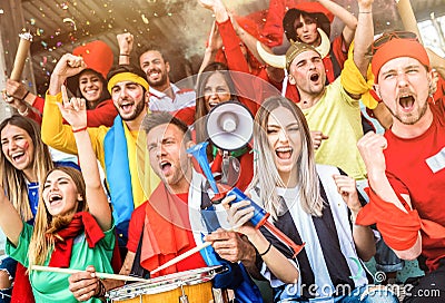 Football supporter fans friends cheering and watching soccer cup Stock Photo