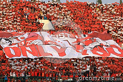 Football Supporters Pasoepati action while supporting his favorite team Persis Solo Editorial Stock Photo