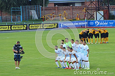 Football teams Desna Chernigiv and Alexandria are photographed in full squads before match Editorial Stock Photo