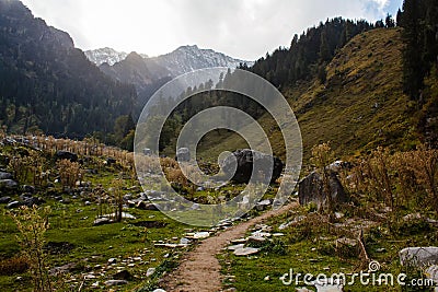 Footpath in himalayan mountains in india in sunset light Stock Photo