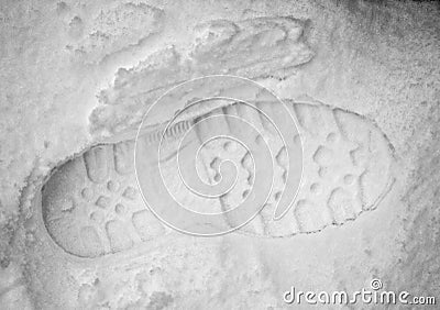 Footprint in snow Stock Photo
