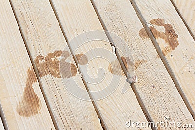 Footprint on wood plank Stock Photo