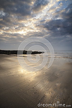 Footprints on beach Summer sunset landscape Stock Photo