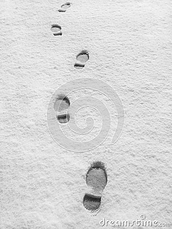 Footprints in fresh snow Stock Photo