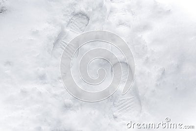 Footprints fresh snow. Footprints in the white snow, snowdrift. Stock Photo