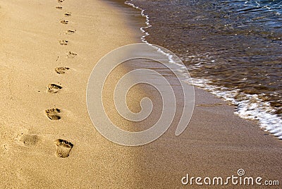 Footprints on the sand Stock Photo
