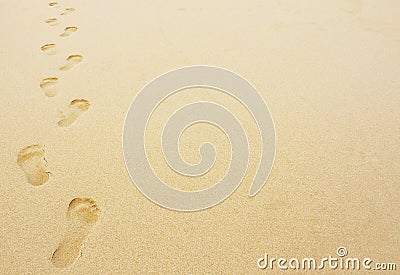 Footprints in the sand background Stock Photo