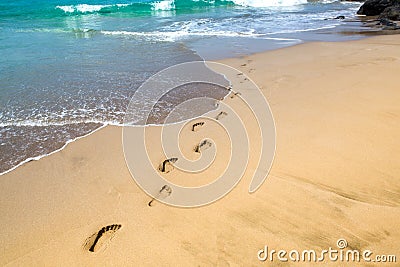 Footprints in the sand Stock Photo