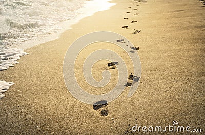 Footprints in the sand Stock Photo