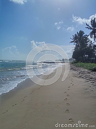 Footprints on the shore of the Indian Ocean Stock Photo