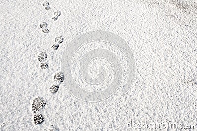 Footprints in the snow background Stock Photo