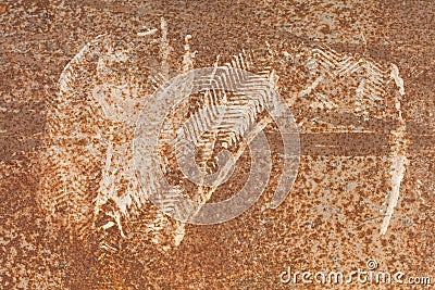 Footprints stained on old rusted steel. Stock Photo