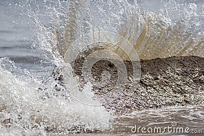 Force of nature. Splashing wave energy. Splash as sea water hits Stock Photo