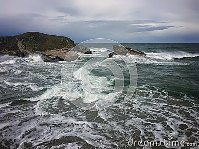 The force of the sea on the Asturian coast a dark day Stock Photo