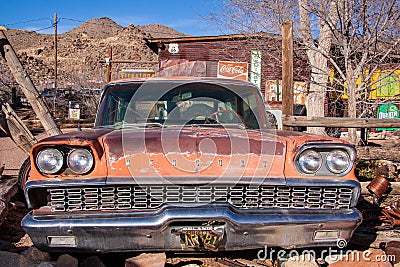 Ford Mercury salvage on a backyard of a store at a route 66 Editorial Stock Photo