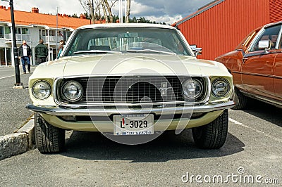 Ford Mustang cream colored Editorial Stock Photo