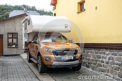 Ford Ranger pickup in a caravan version parked near the house ready for next adventure Editorial Stock Photo