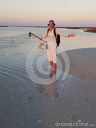 Fording the river while trekking Stock Photo