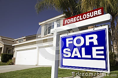 Foreclosure For Sale Real Estate Sign and House Stock Photo