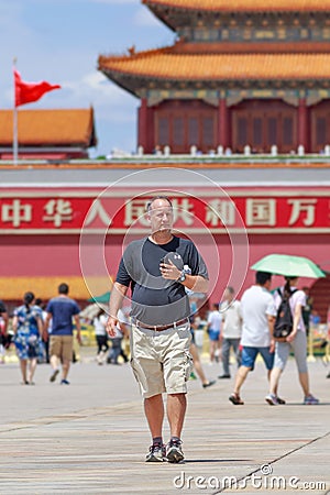 Foreign tourist on a sunny Tiananmen Square, Beijing, China Editorial Stock Photo