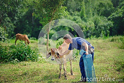 Foreign tourists in Thailand, traditional Thai dress farmer back Stock Photo