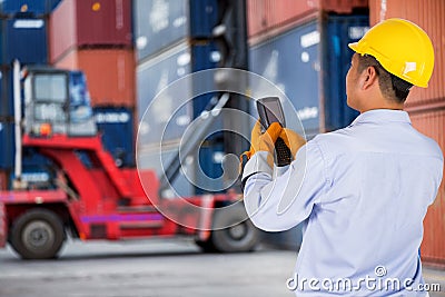 Foreman control forklift handling the container box Stock Photo